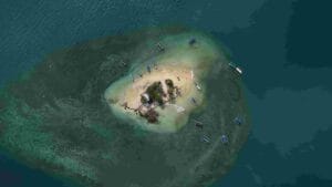 Pemandangan udara pulau Gili Kedis Lombok yang berbentuk hati, salah satu spot Island Hopping Gili Nanggu